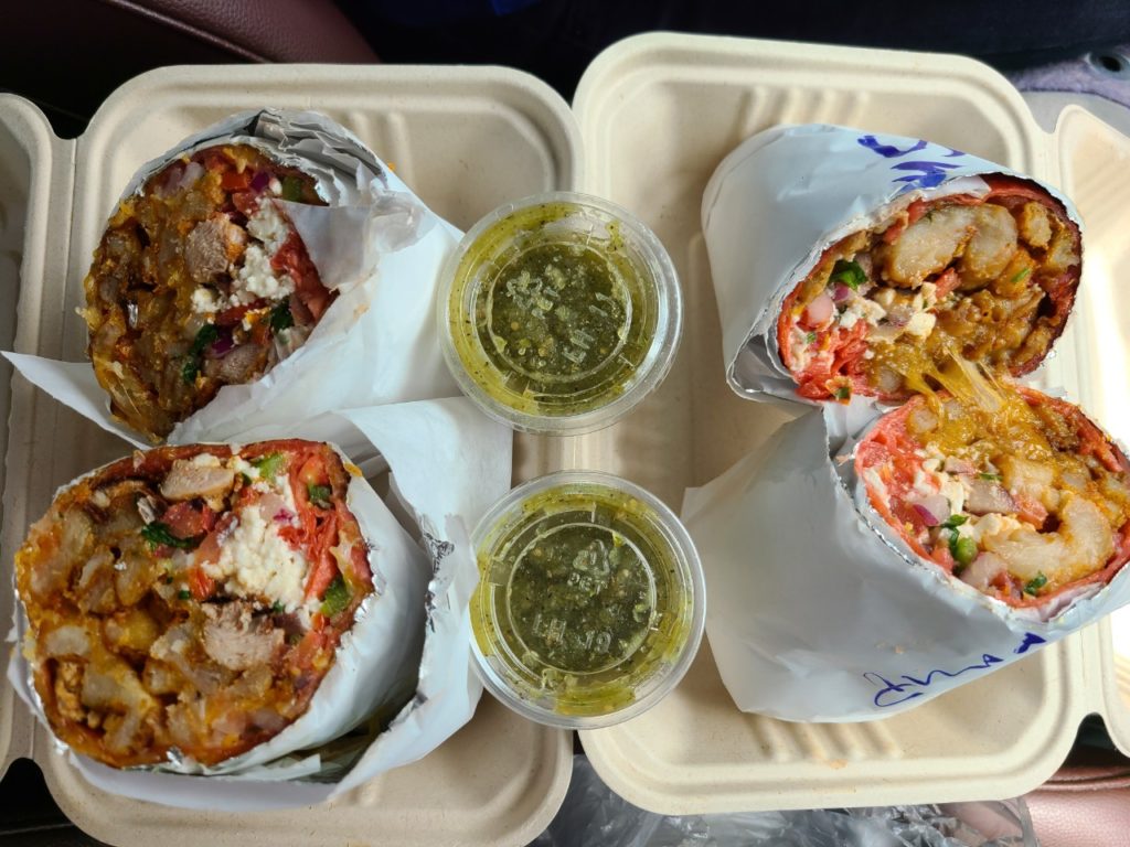 Chicken burrito with Bomba Style, Shrimp Burrito, and Two Salsa Verde Sauces of Burrito Bomba Glendale